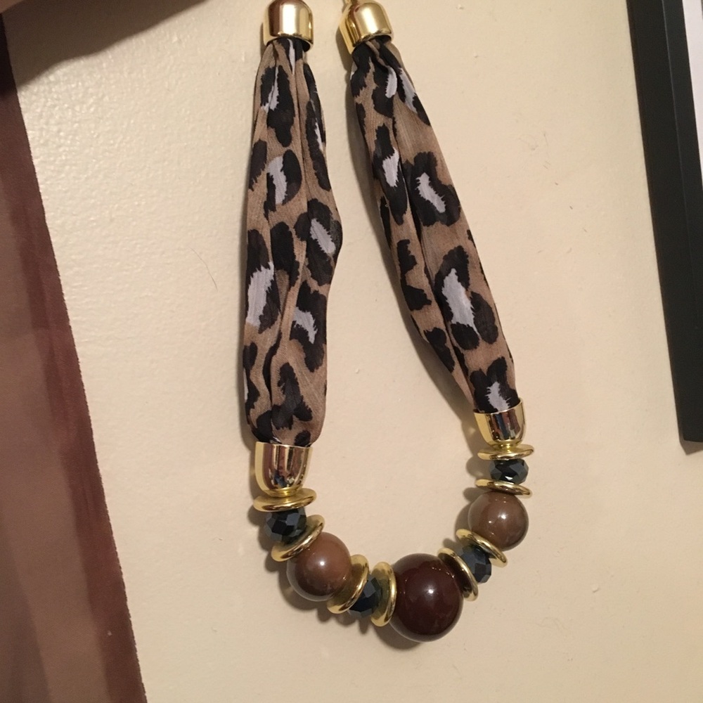 Leopard stud necklace.